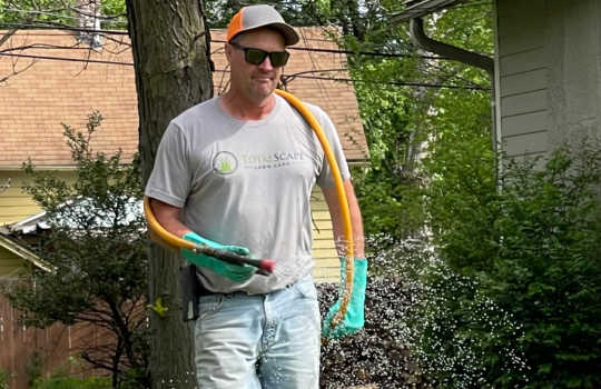 Jeff Spraying a lawn